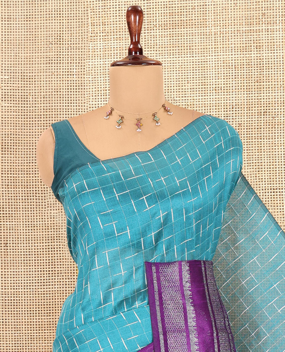 Blue Semi-Raw Silk Saree Features Maze-Like Checks, a Contrast Traditional Zari Border, Striped Pallu, and a Contrast Blouse