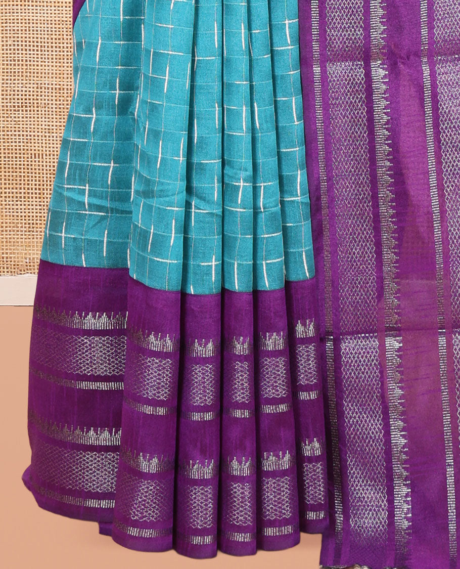 Blue Semi-Raw Silk Saree Features Maze-Like Checks, a Contrast Traditional Zari Border, Striped Pallu, and a Contrast Blouse