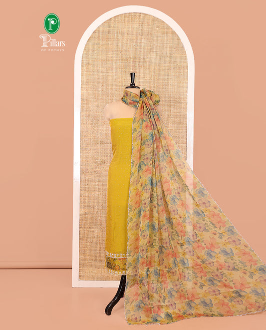 Yellow Moss Organza Material Chudidar Set, Gleamed Up with Stonework Top, a Plain Santoon Bottom, and Paired with Floral Print and Scallop Stonework Dupatta