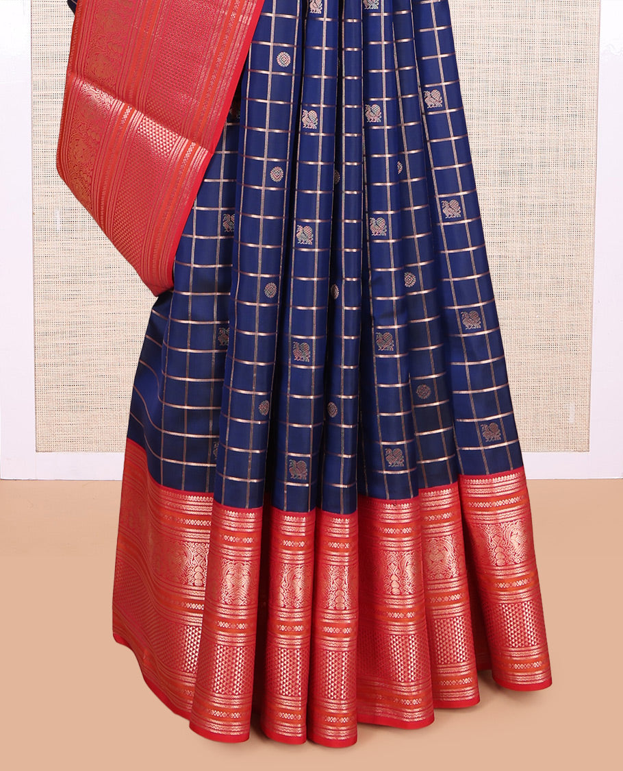 Blue zari checked with annam chakram buttas silk saree, contrast border of thilakam mokku, iruthalai pakshi, and ara maadam designs, and jaal pallu