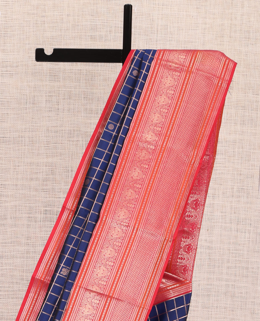 Blue zari checked with annam chakram buttas silk saree, contrast border of thilakam mokku, iruthalai pakshi, and ara maadam designs, and jaal pallu
