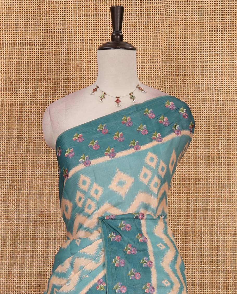 Sea Green pochampally ikkat style geometric printed fancy tussar saree, contrast floral motifs thread embroidered border, ikkat printed pallu, and plain blouse