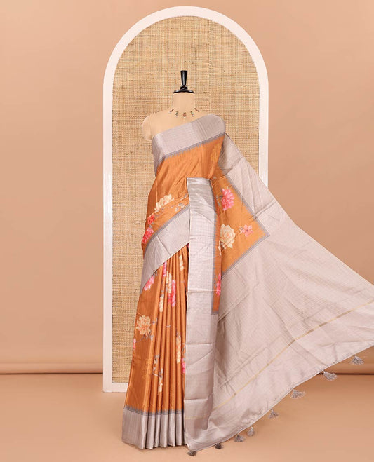 Mustard floral motifs printed fancy tussar saree, contrast temple checked border, checked pallu, and a contrast checks and floral printed blouse