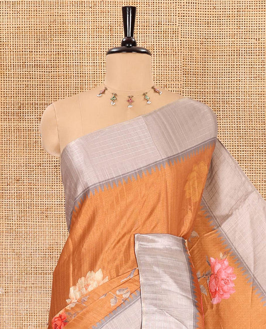 Mustard floral motifs printed fancy tussar saree, contrast temple checked border, checked pallu, and a contrast checks and floral printed blouse