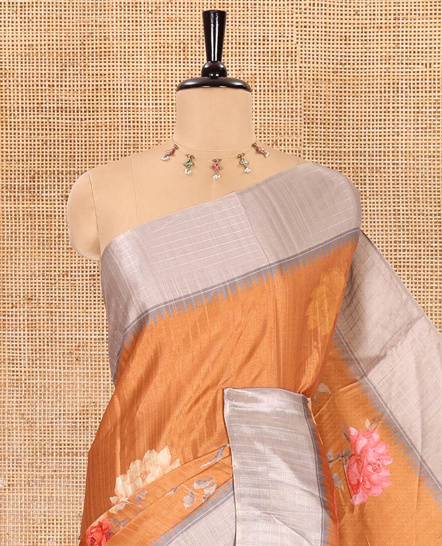 Mustard floral motifs printed fancy tussar saree, contrast temple checked border, checked pallu, and a contrast checks and floral printed blouse