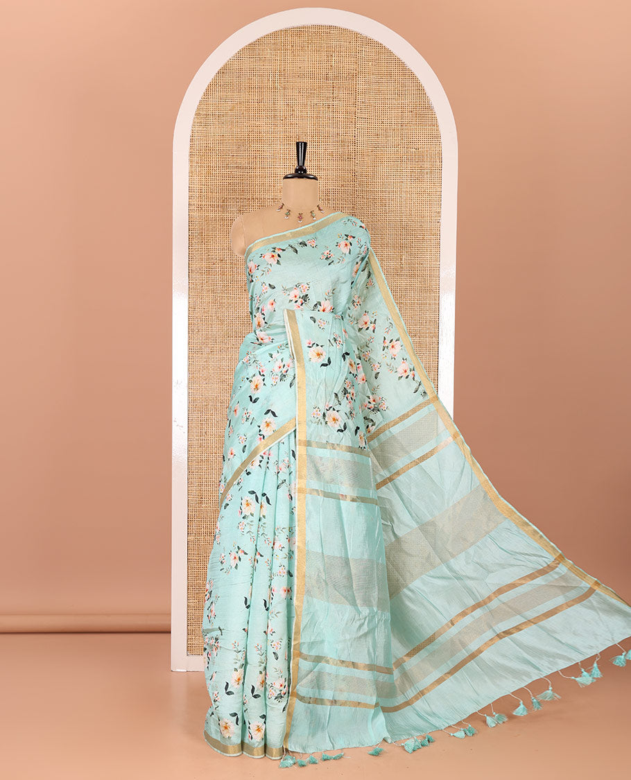 Mint green floral motifs digital printed banana pith saree, piping border, striped pallu, and floral printed blouse