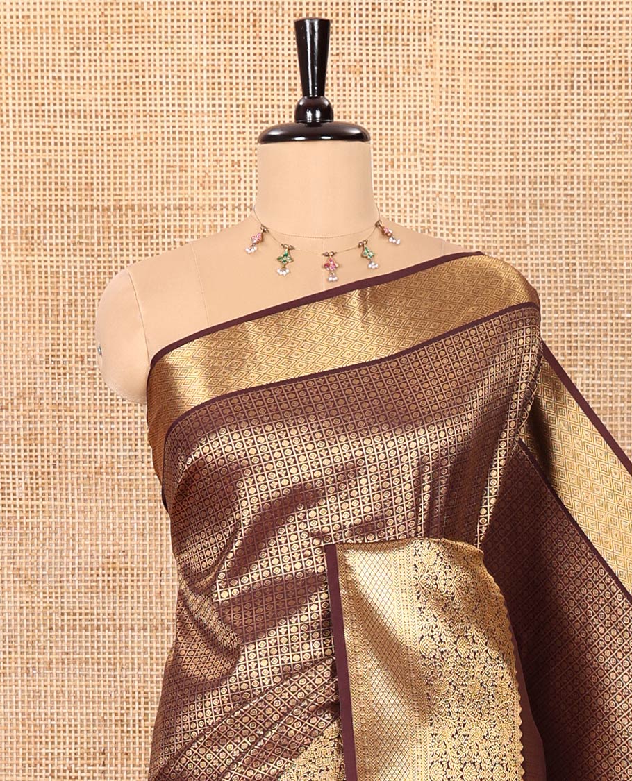 Coffee Brown Kanchipuram Budget Silk Saree Richly Detailed with Jacquard Design, Highlighted by Zari Border of Floral and Jaal Designs, Pallu Embellished with Big Paisley Designs, and Paired with a Matching Blouse