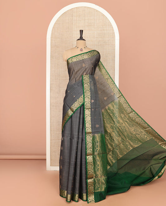 Grey Silk Cotton Saree Prettified with Floral Buttas All Over the Body, Complemented by a Contrast Floral Creeper Border, Featuring a Contrast Pallu of Floral Zari Designs, and Paired with a Contrast Blouse