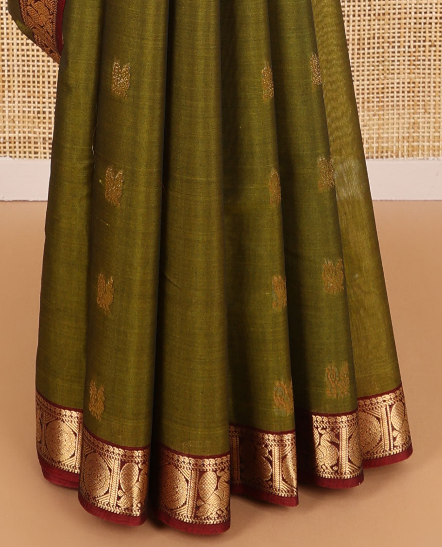 Green motifs silk cotton saree with intricate zari design border & floral design pallu