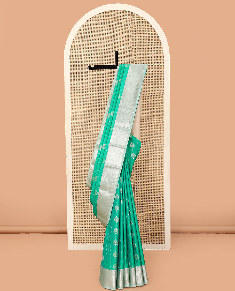 Green zari design soft silk saree, contrast traditional zari design border, and jaal design pallu