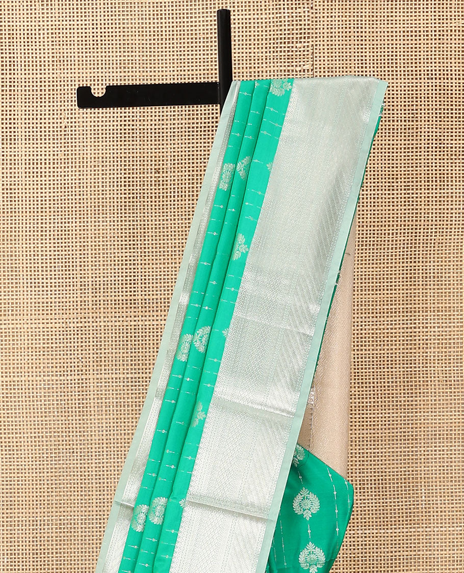 Green zari design soft silk saree, contrast traditional zari design border, and jaal design pallu