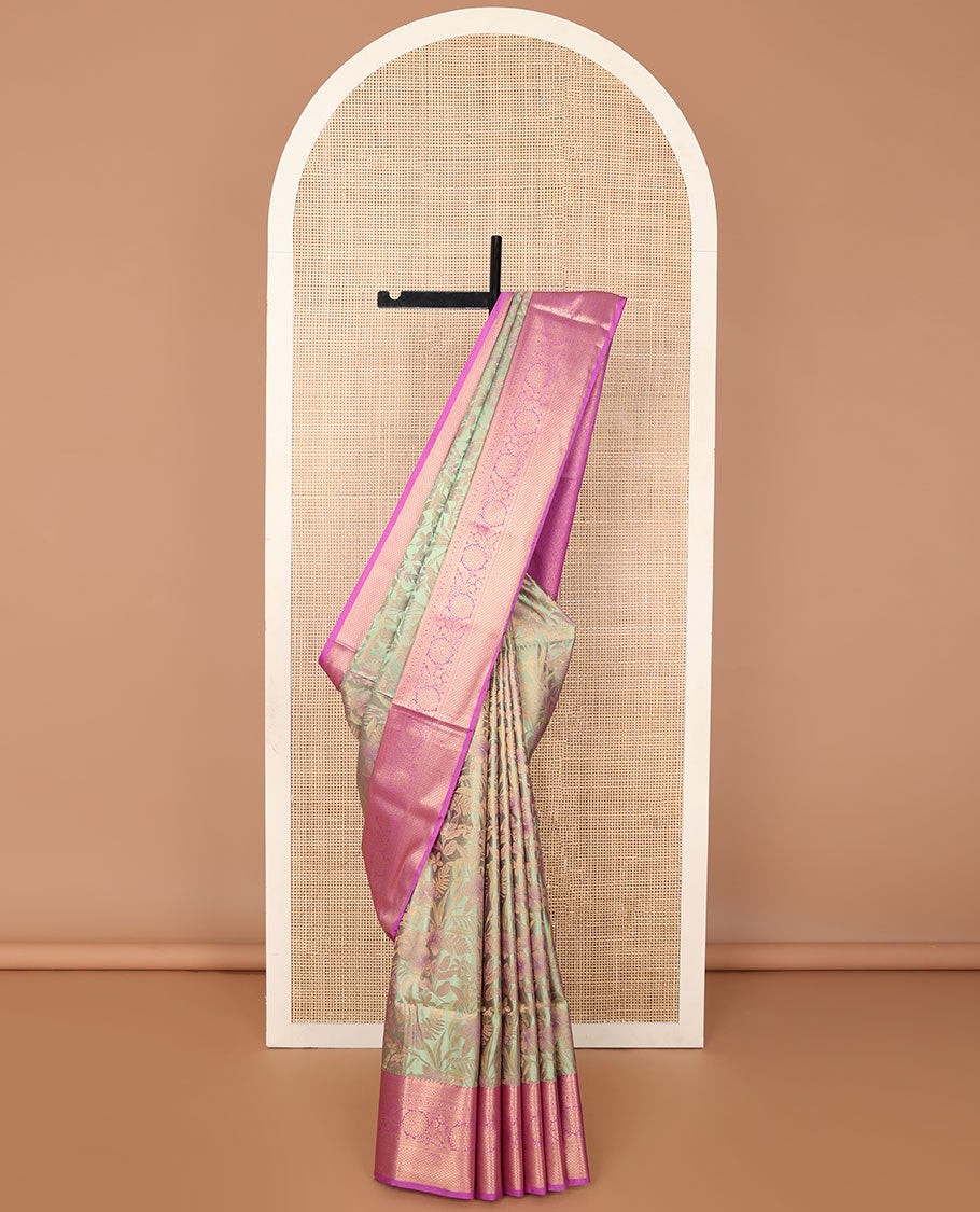 Green floral jacquard soft silk saree with contrast intricate zari design border & checked pallu