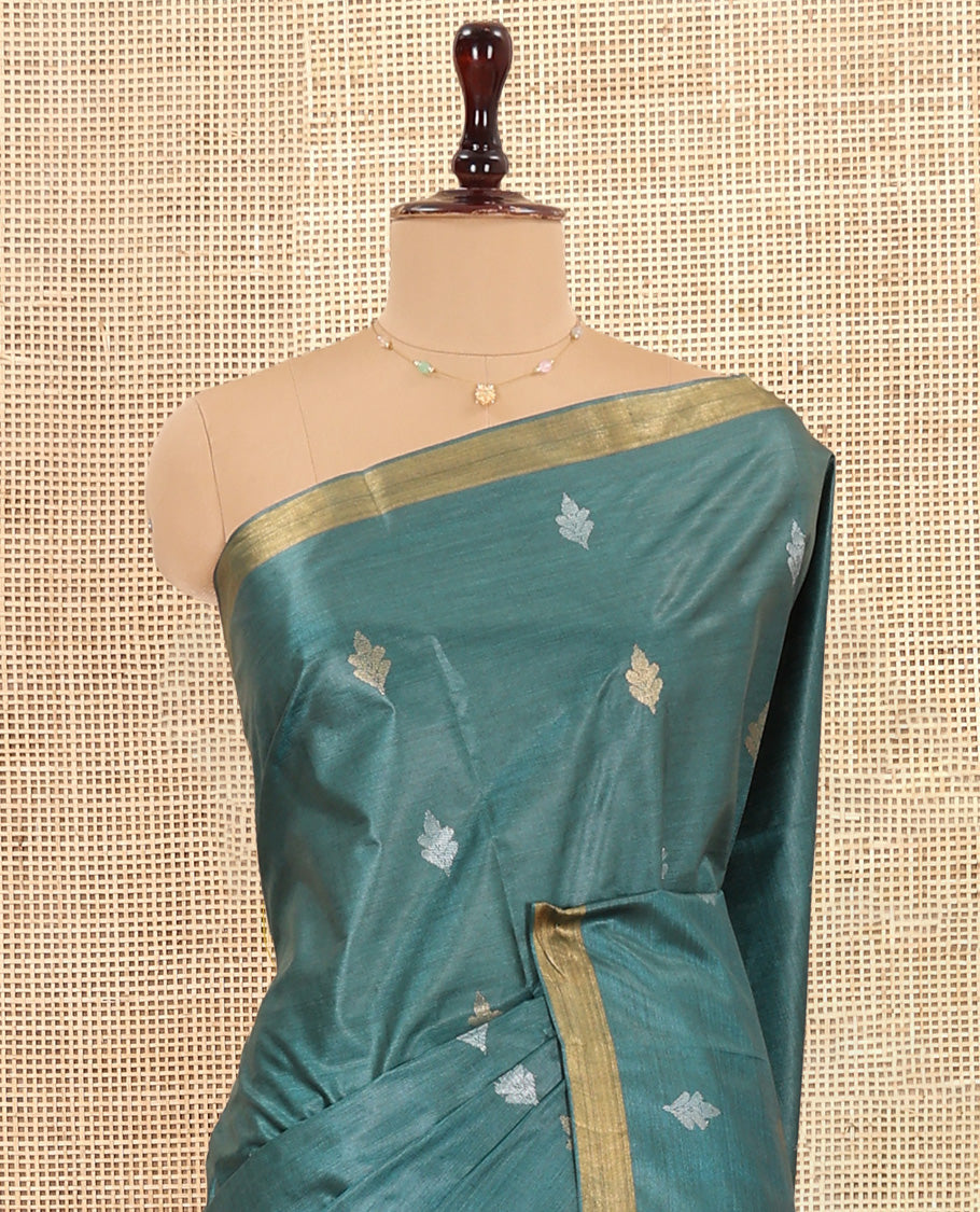 Green Tussar Saree, Detailed with Buttas, a Piping Border, Floral Vine-Woven Pallu, and a Matching Blouse