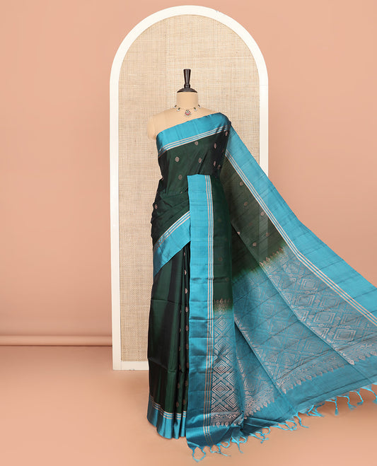 Green Semi Uppada Saree Enthralled with Zari Buttas, Complemented by a Contrast Border, Gleaming Pallu of Jaal Designs, and Paired with a Contrast Blouse