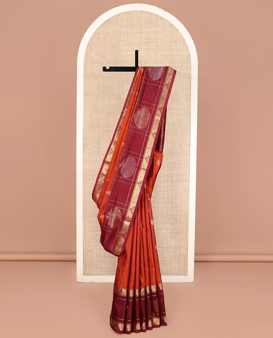 Orange Uppada Silk Saree, Mesmerized with Zari Buttas All Over Its Body, Complemented by a Contrast Traditional Border of Diamond Designs, Pallu Woven with Floral Jaal Designs, and Paired with a Contrast Blouse