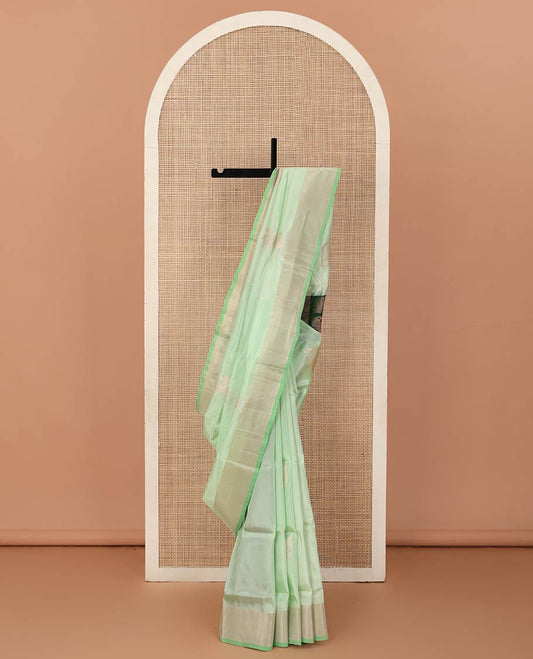 Pista green zari buttas Uppada saree, bavanji border, and contrast paisley design pallu