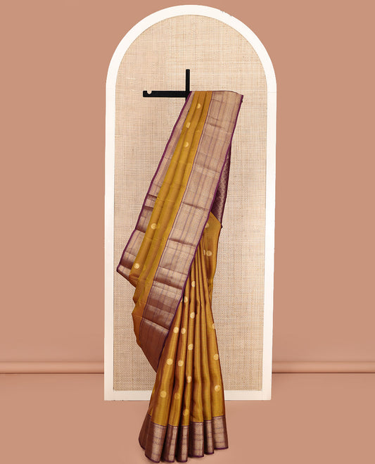 Mustard Vasundhara Lite Silk Mix Saree, Subtly Woven with Zari Buttas, Complemented by a Contrast Border of Rekku, Muthu, Vanki, and Mayil Kann Designs, Majestically Detailed Pallu of Ogee Patterns, and Paired with a Contrast Blouse