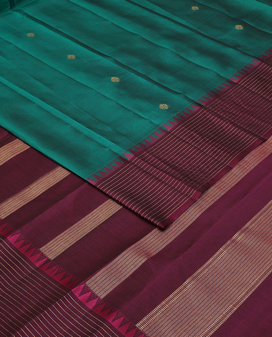 Green zari buttas Vasundhara elite silksaree, contrast border of rekku & strip design & muthu striped pallu