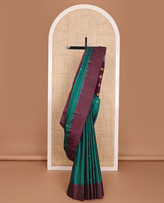 Green zari buttas Vasundhara elite silksaree, contrast border of rekku & strip design & muthu striped pallu