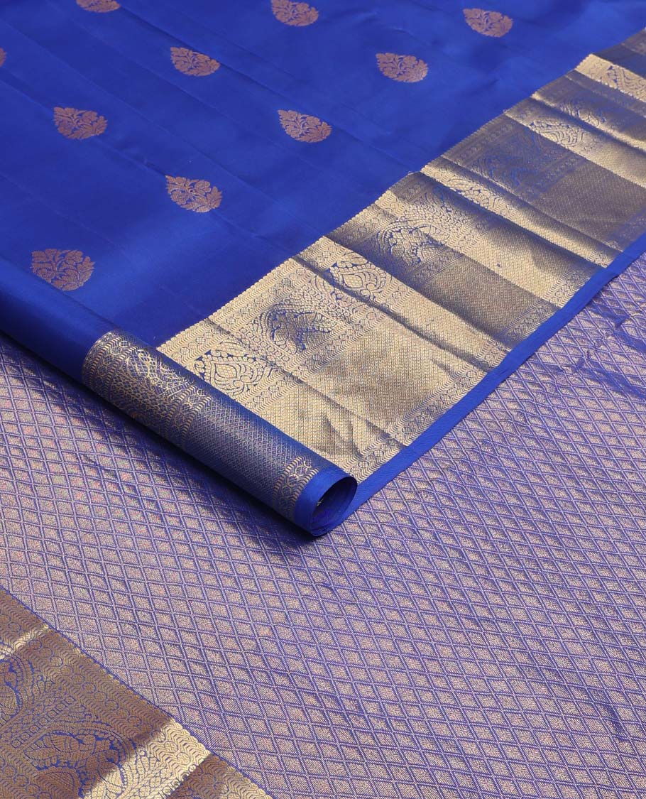 Blue zari buttas Vasundhara silk mix saree, zari border of thilakam, poun, rettai mayil, and mayil kann designs, and jaal pallu