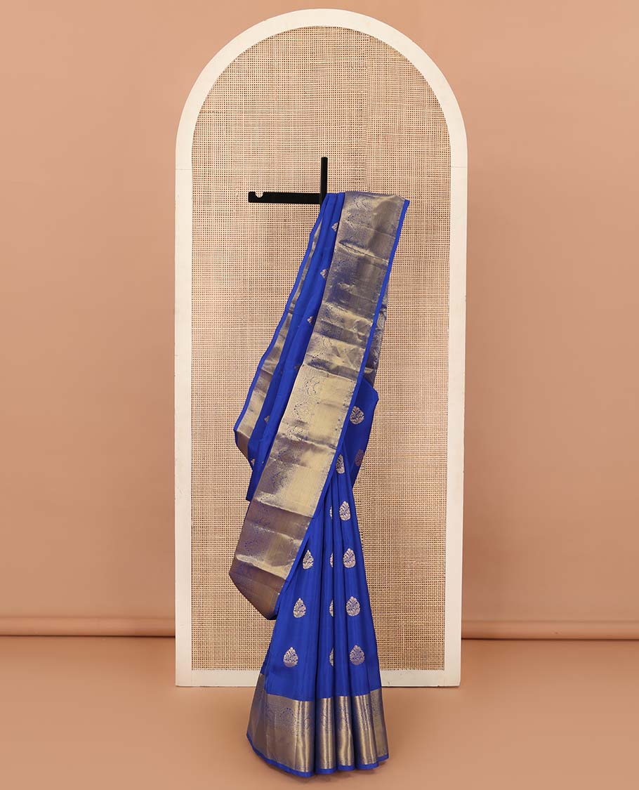 Blue zari buttas Vasundhara silk mix saree, zari border of thilakam, poun, rettai mayil, and mayil kann designs, and jaal pallu