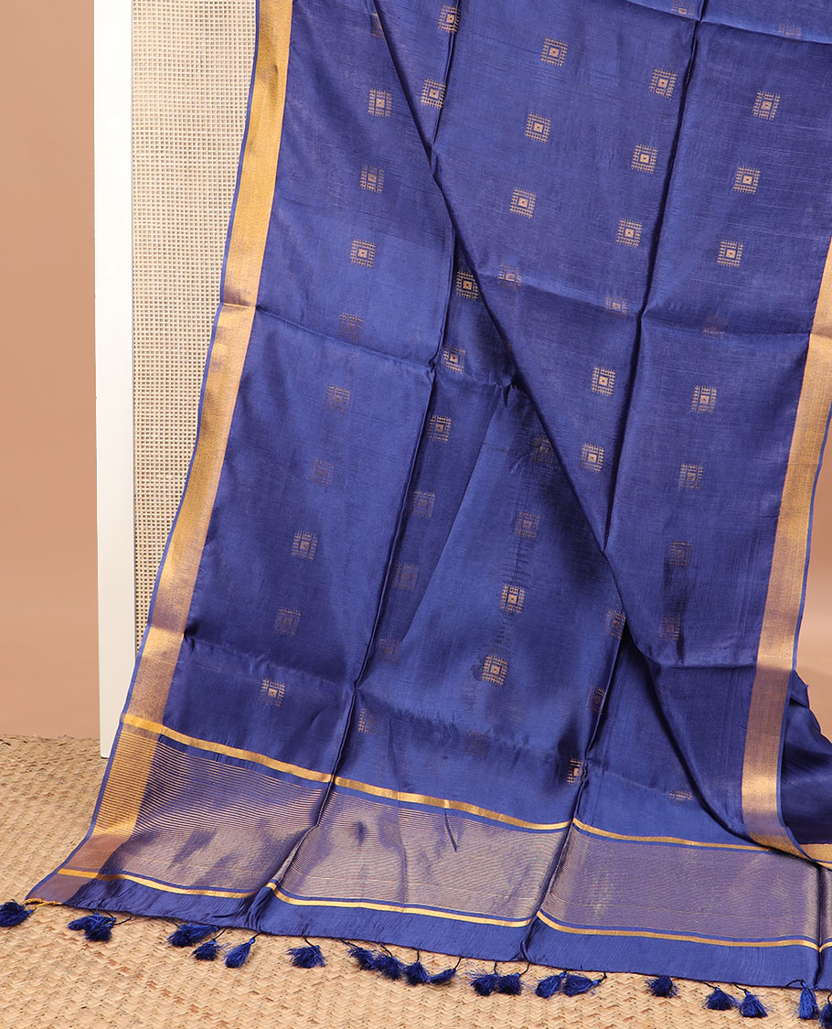 Navy blue buttas banana pith saree, bavanji zari border, and zari striped pallu