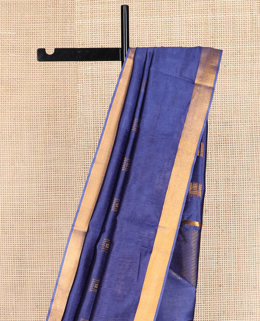 Navy blue buttas banana pith saree, bavanji zari border, and zari striped pallu