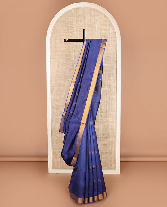 Navy blue buttas banana pith saree, bavanji zari border, and zari striped pallu