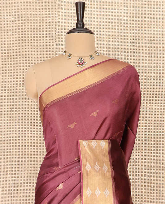 Redwood Color Banana Pith Saree Highlighted with Zari Buttas, Subtly Woven Piping Border, Pallu of Zari Stripes, and Paired with a Matching Plain Blouse