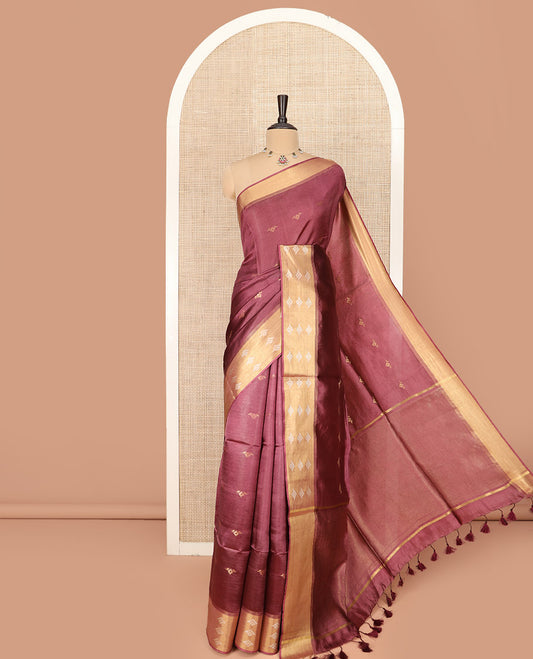 Redwood Color Banana Pith Saree Highlighted with Zari Buttas, Subtly Woven Piping Border, Pallu of Zari Stripes, and Paired with a Matching Plain Blouse
