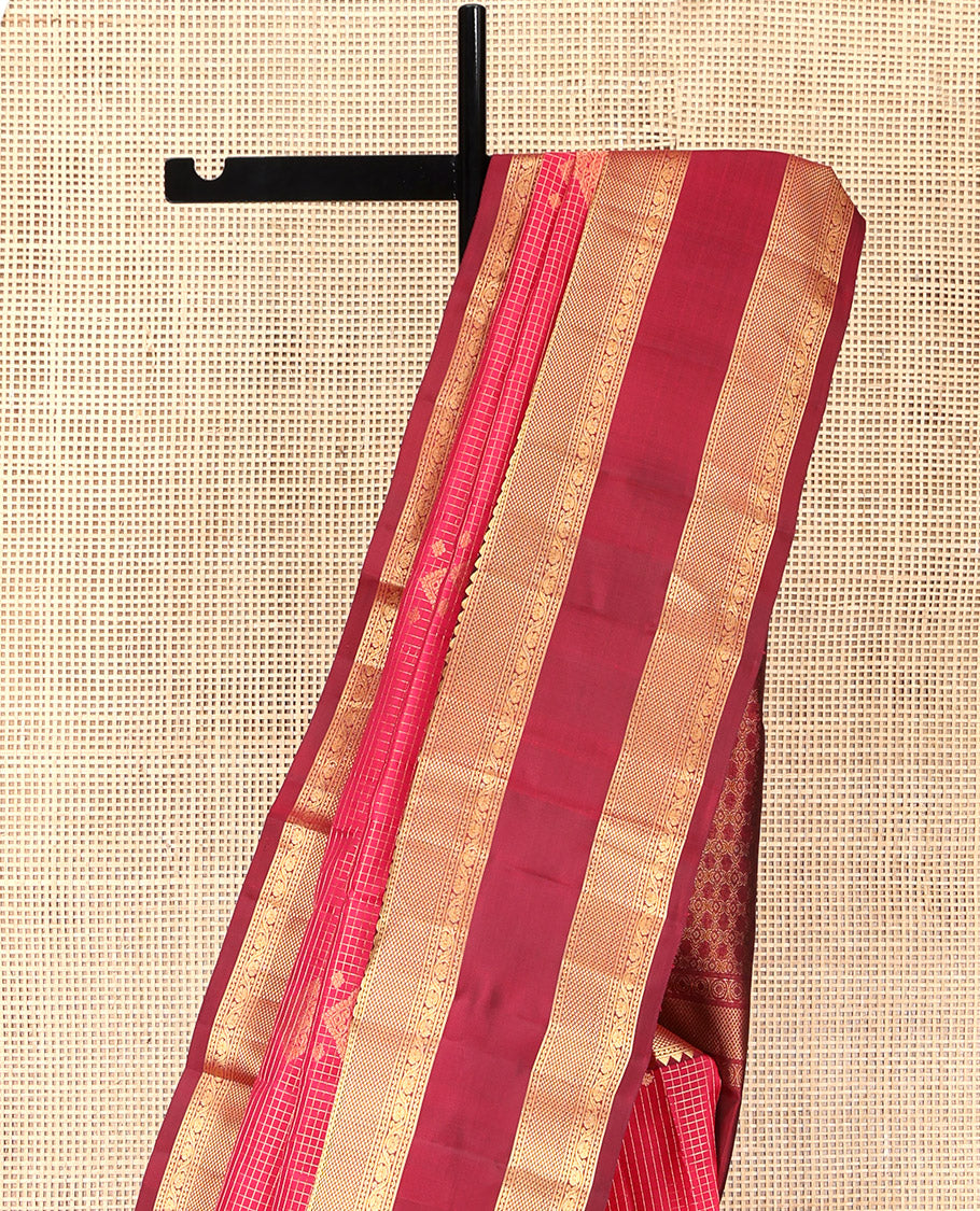 Pink Vasundhara Silk Saree, Gracefully Embellished with Zari Buttas and Checks, a Contrast Rettai Pettu Border of Rekku, Neli, Kodi Visiry, and Mayil Kann, Grand Pallu, and a Contrast Blouse