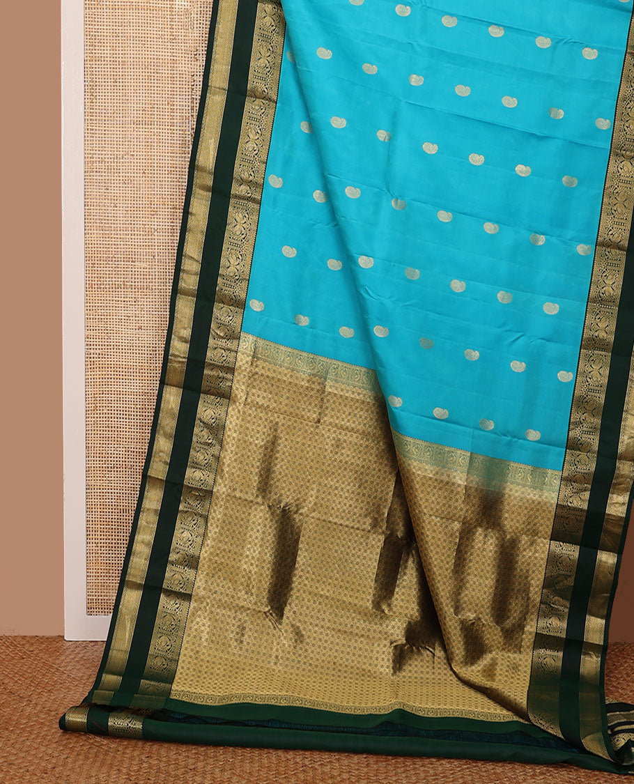 Blue manga buttas silk saree, contrast rettai pettu border of rekku,neli,mayil,banaras & mayil kann & jaal pallu