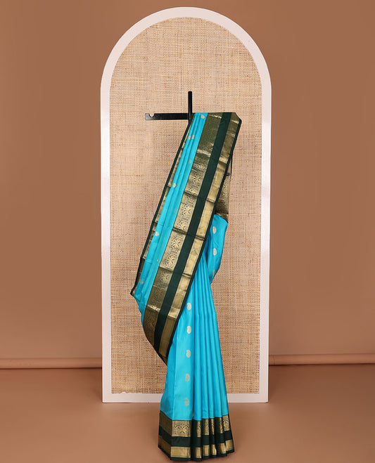 Blue manga buttas silk saree, contrast rettai pettu border of rekku,neli,mayil,banaras & mayil kann & jaal pallu
