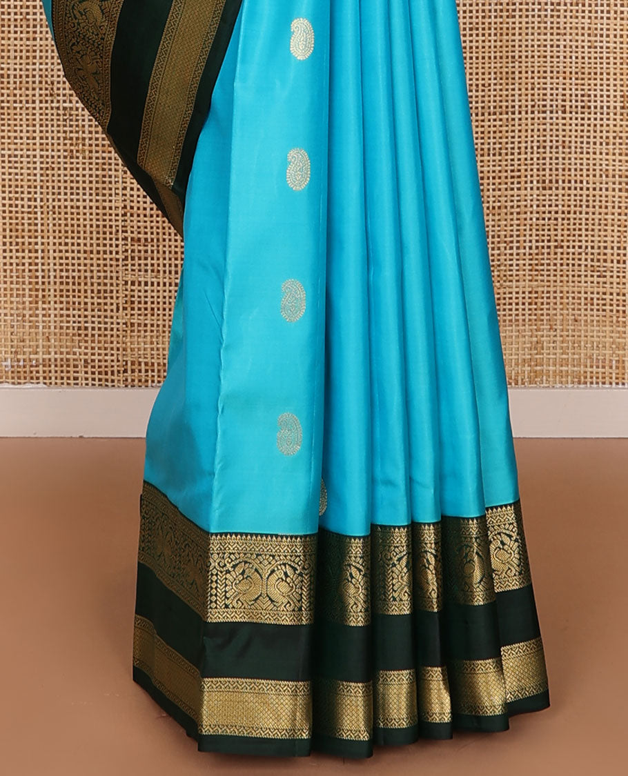 Blue manga buttas silk saree, contrast rettai pettu border of rekku,neli,mayil,banaras & mayil kann & jaal pallu