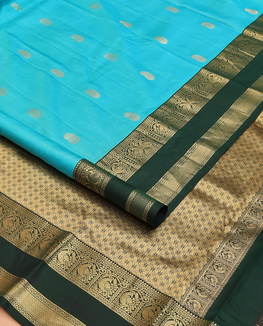 Blue manga buttas silk saree, contrast rettai pettu border of rekku,neli,mayil,banaras & mayil kann & jaal pallu