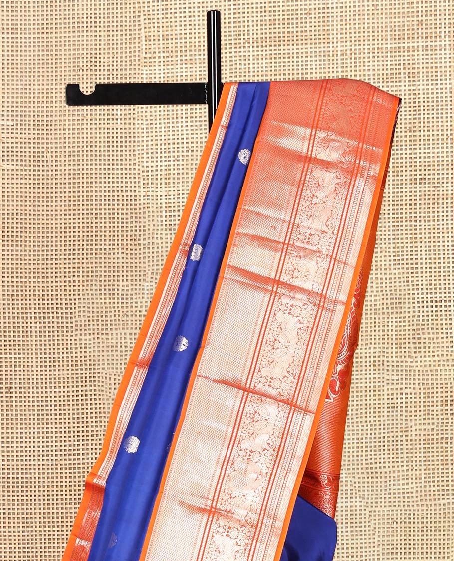 Blue Vasundhara Silk Saree Featuring Zari Buttas, Complemented by a Contrast Border of Vanki and Pichwai Cow Designs, Grand Pallu, and Contrast Blouse