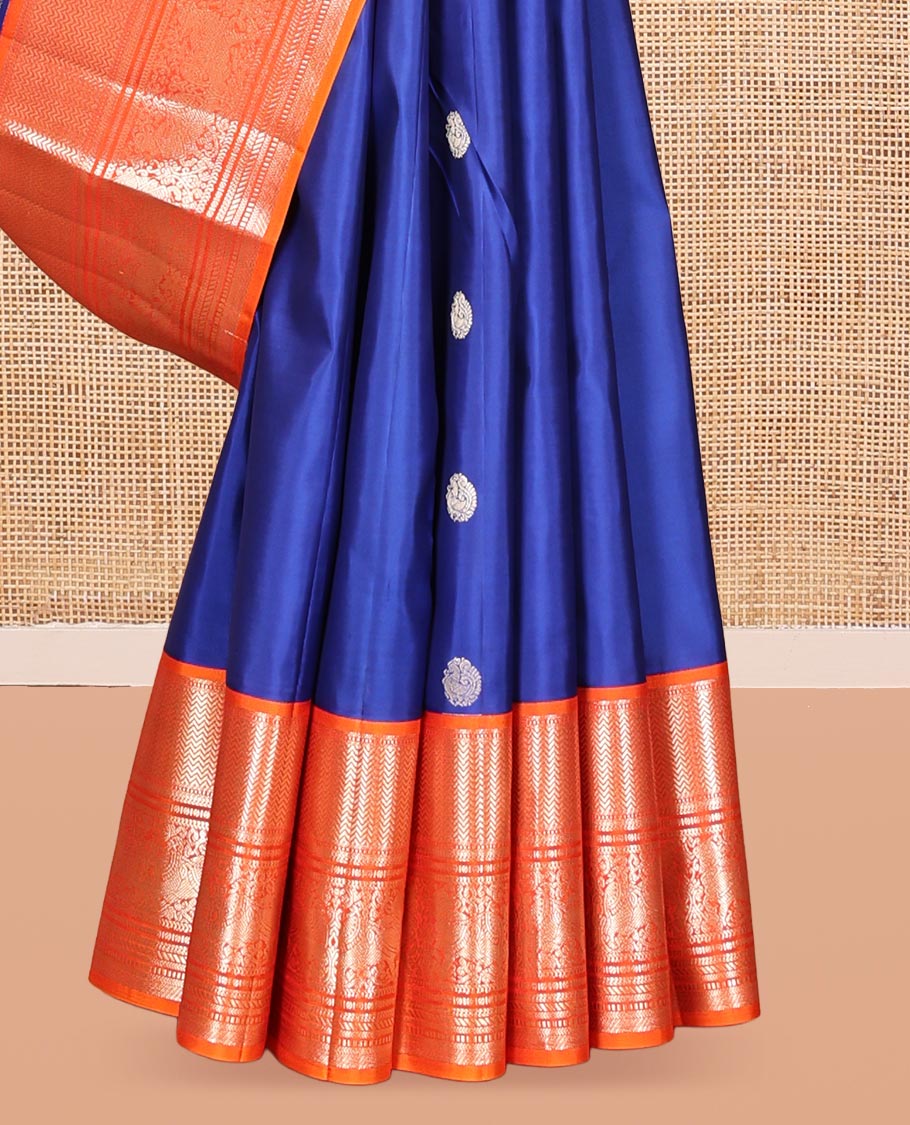 Blue Vasundhara Silk Saree Featuring Zari Buttas, Complemented by a Contrast Border of Vanki and Pichwai Cow Designs, Grand Pallu, and Contrast Blouse
