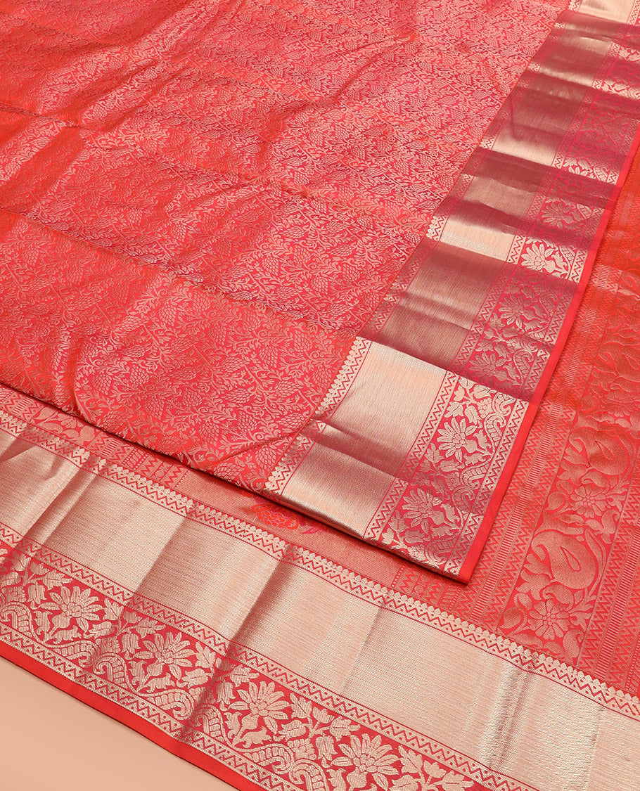 Red Kanchipuram Silk Saree Majestically Detailed with Floral Jacquard Design, Highlighted with Zari Border of Thilakam, Neli, and Floral Designs, Impeccably Designed Pallu of Floral-Geometric Designs, and Paired with a Matching Blouse