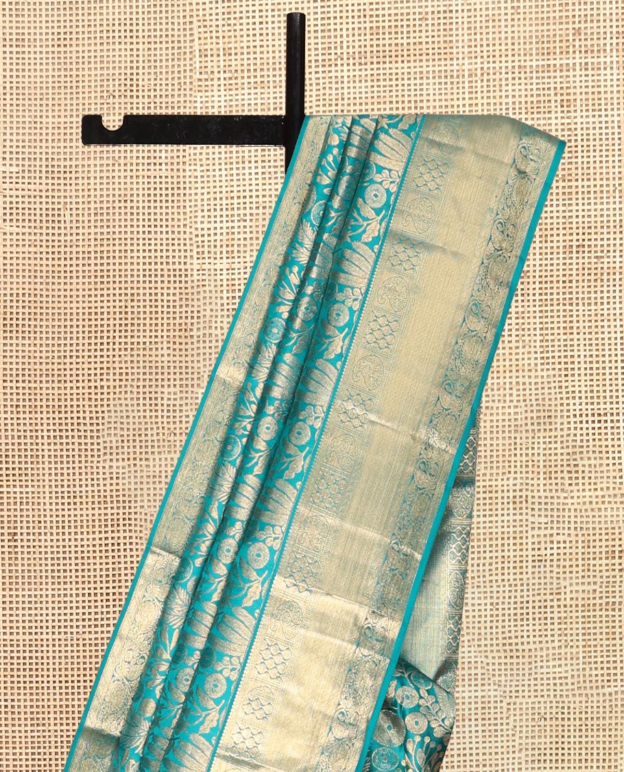 Blue Kanchipuram Wedding Silk Saree, Embellished with Jacquard Design, a Zari Border of Manga and Kodi Visiry Designs, Grand Pallu, and a Matching Blouse