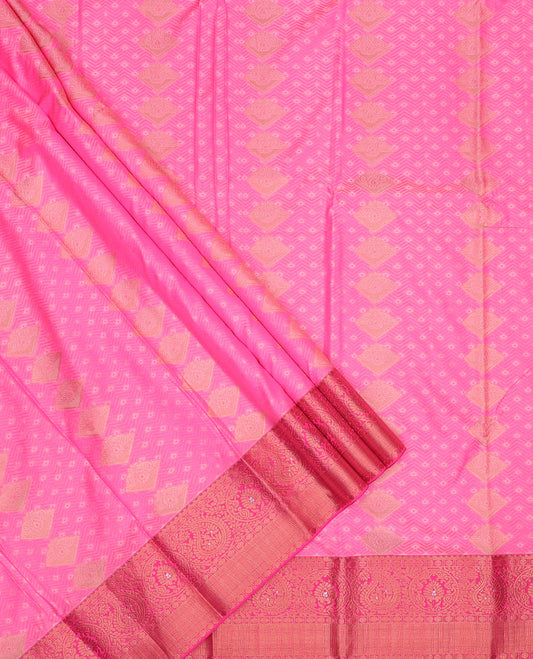 Pink art silk pavadai set, embossed, zari design with contrast traditional zari bordered skirt and a contrast zari design blouse