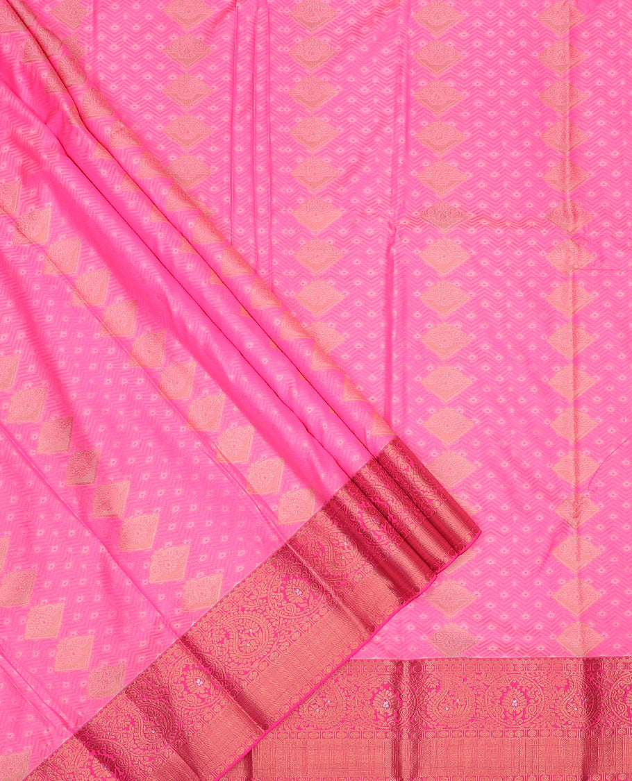 Pink art silk pavadai set, embossed, zari design with contrast traditional zari bordered skirt and a contrast zari design blouse