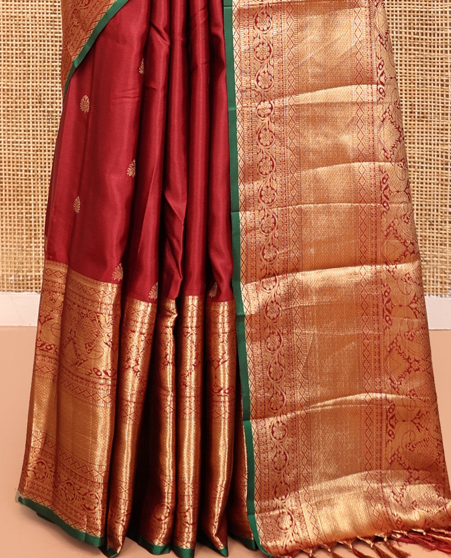 Maroon Budget Silk Saree, Dazzled with Zari Buttas, Highlighted by a Traditional Zari Border, Grand Ogee Pallu, and a Matching Blouse
