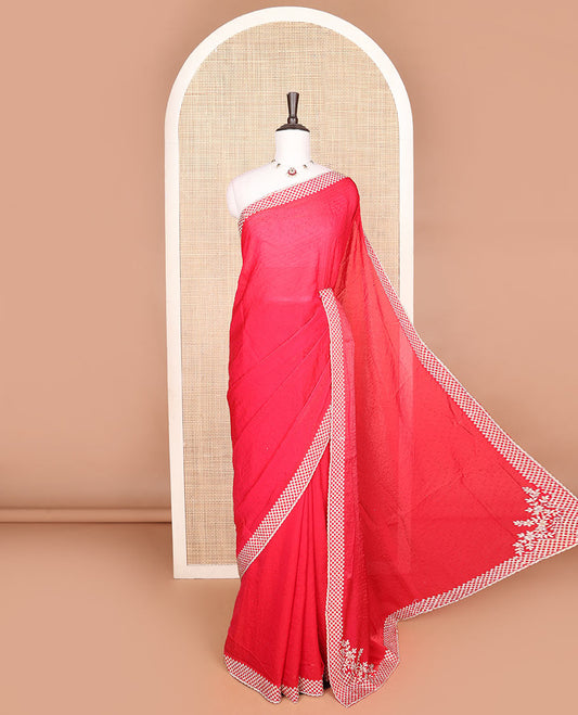Red embroidery designer saree with stones embedded in its body, scallop stone work border