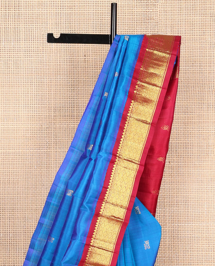 Blue zari buttas Kanchipuram silksaree, contrast one-sided korvai border of thilakam mokku & jaal design & zari design pallu