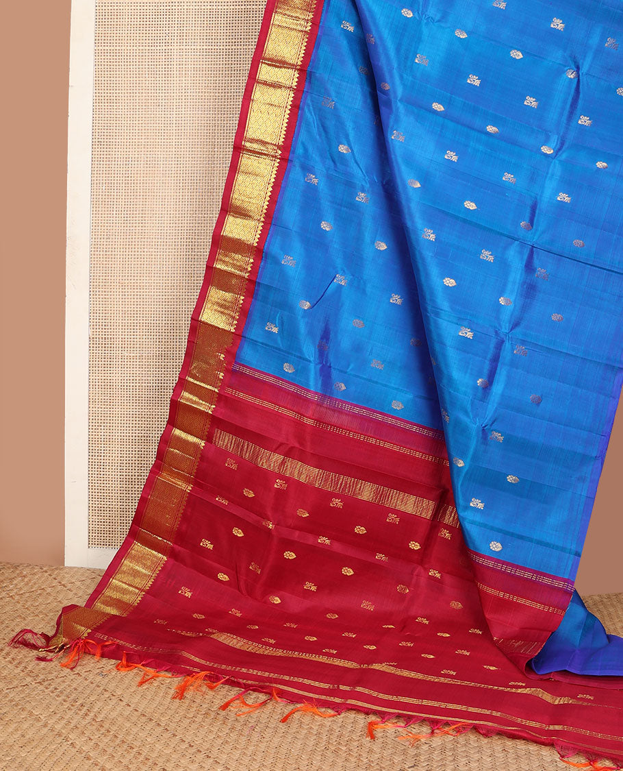 Blue zari buttas Kanchipuram silksaree, contrast one-sided korvai border of thilakam mokku & jaal design & zari design pallu