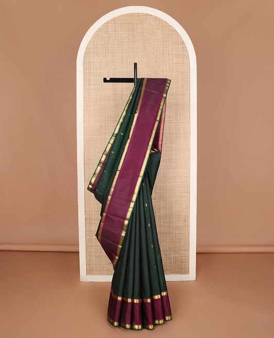 Green zari buttas Kanchipuram silk saree, contrast rettai pettu border of muthu designs, and pallu of muthu designs