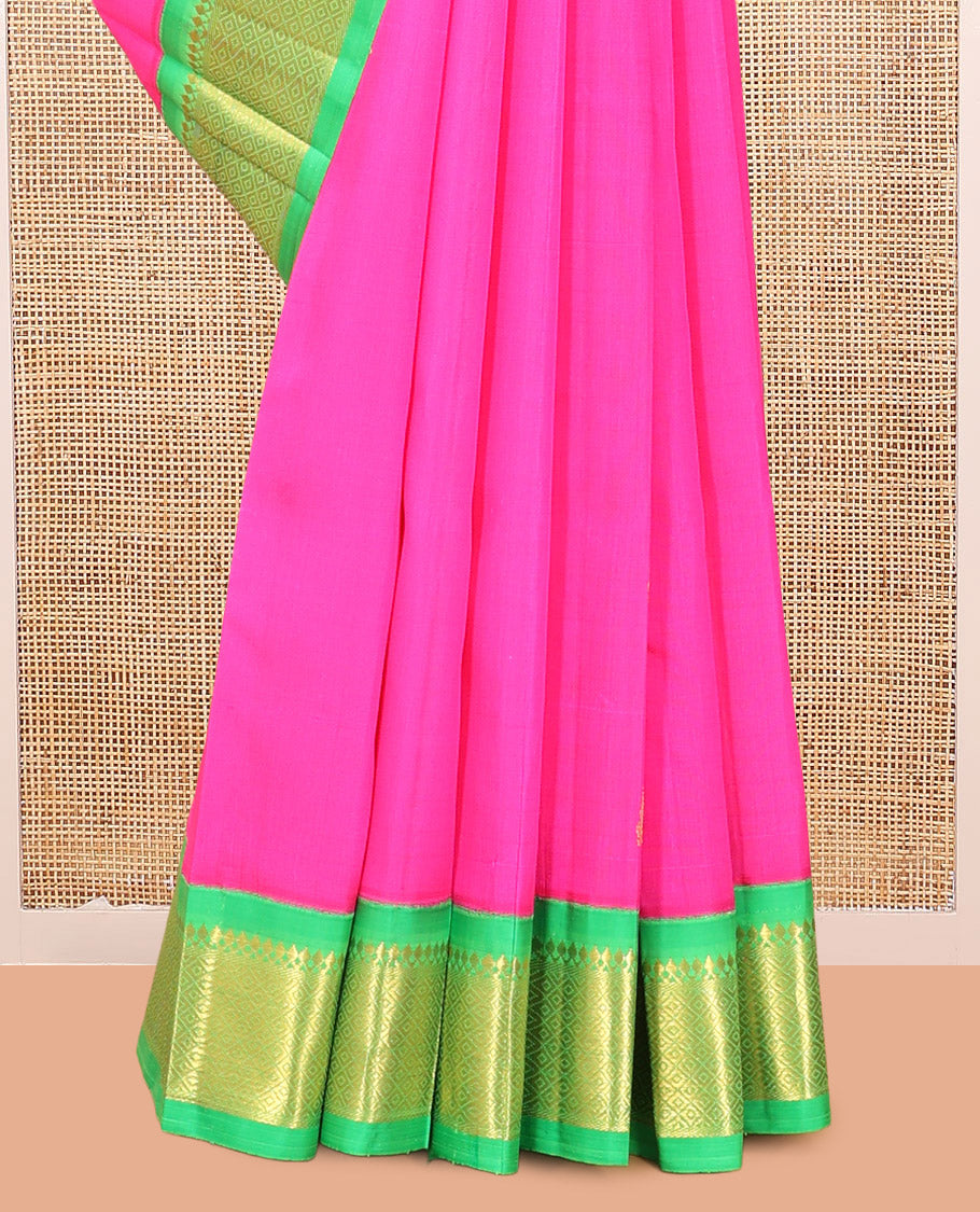 Rani Pink Kanchipuram Silk Saree, Adorned with Zari Buttas, Complemented by a Contrast Korvai Border of Panner Sombu, and Jaal Design, Zari Design Pallu, and No Blouse