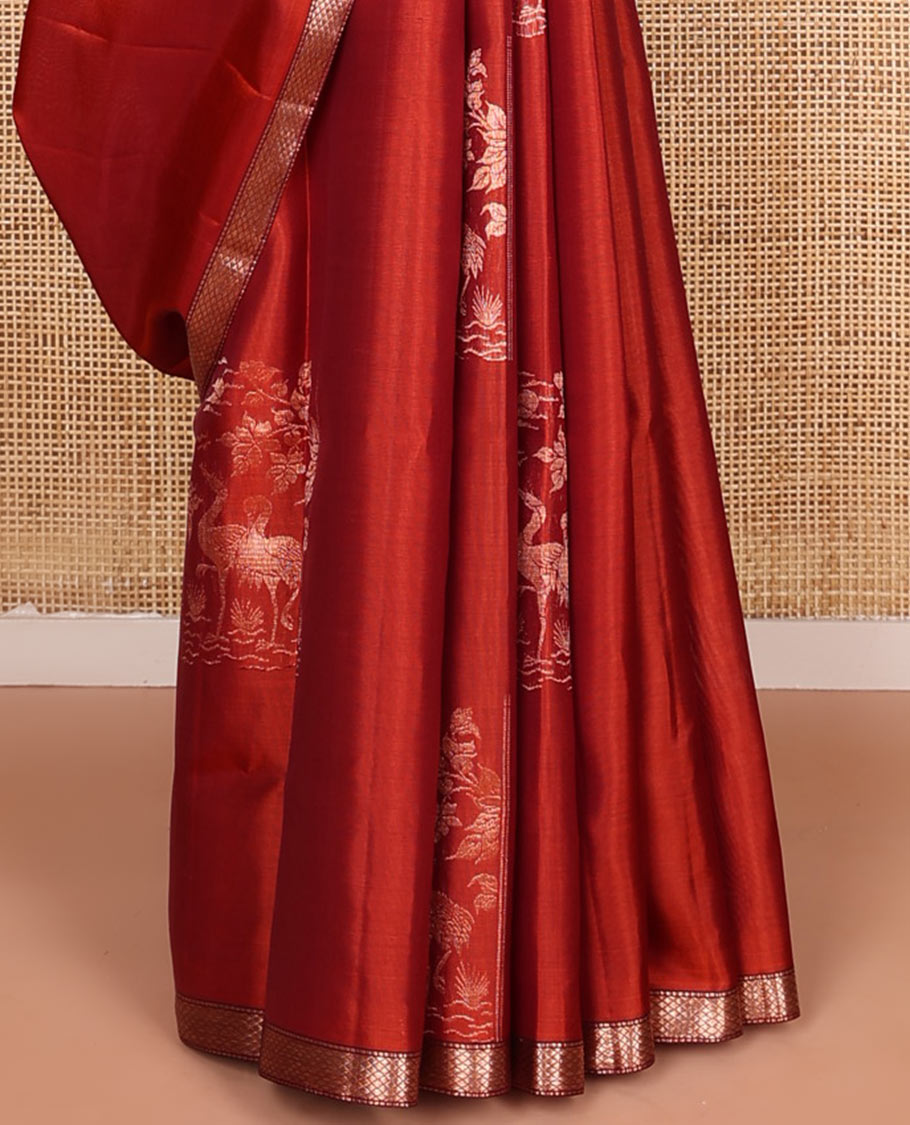 Rust orange bird and floral buttas zari woven soft silk saree, contrast kuyil kann border, and jaal pallu