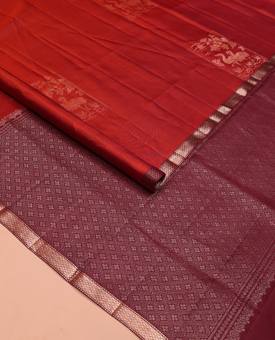 Rust orange bird and floral buttas zari woven soft silk saree, contrast kuyil kann border, and jaal pallu