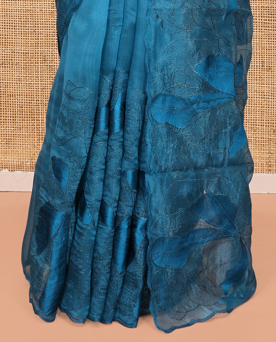 Blue Organza Saree, Steeped in the Prettiness of Floral Thread Embroidery, a Scalloped Embroidery Border, and a Matching Embroidered Blouse